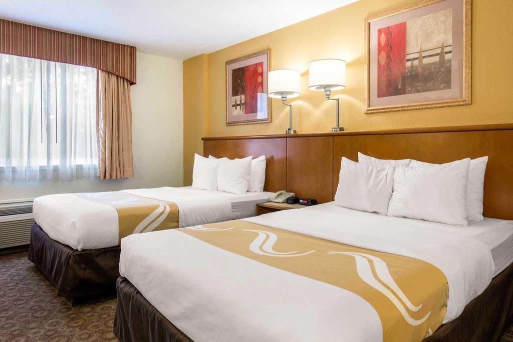 Quality Inn & Suites Near the Theme Parks | 5635 Windhover Dr, Orlando, FL 32819, USA | Phone: (407) 370-5100