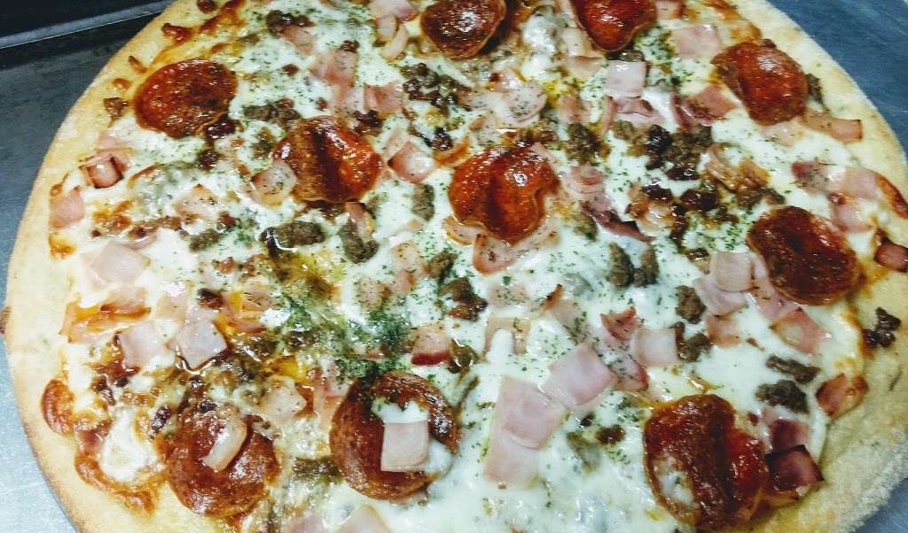 Ugis Pizza | 69 Heath St, Jamaica Plain, MA 02130 | Phone: (617) 606-7160