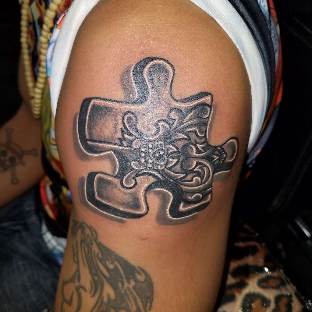 Red Octopus Tattoos | 1654 Solomons Island Rd S, Prince Frederick, MD 20678, USA | Phone: (410) 535-9095