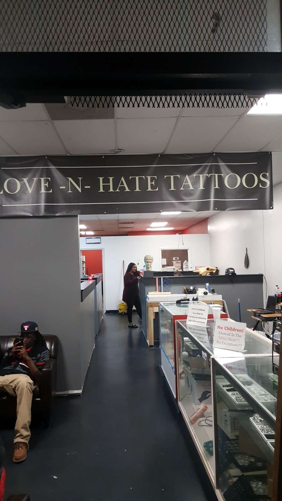 Love-n-hate Tattoos & Novelties | 5038 N Tryon St, Charlotte, NC 28213, USA | Phone: (980) 219-7908