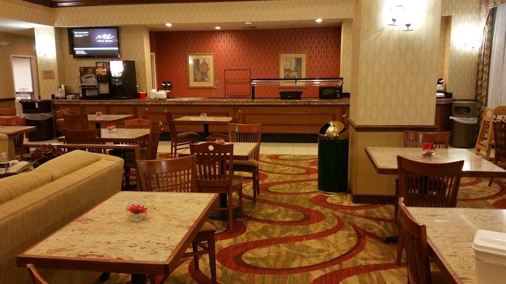 Ramada by Wyndham Suites Orlando Airport | 7500 Augusta National Dr, Orlando, FL 32822, USA | Phone: (407) 641-5484