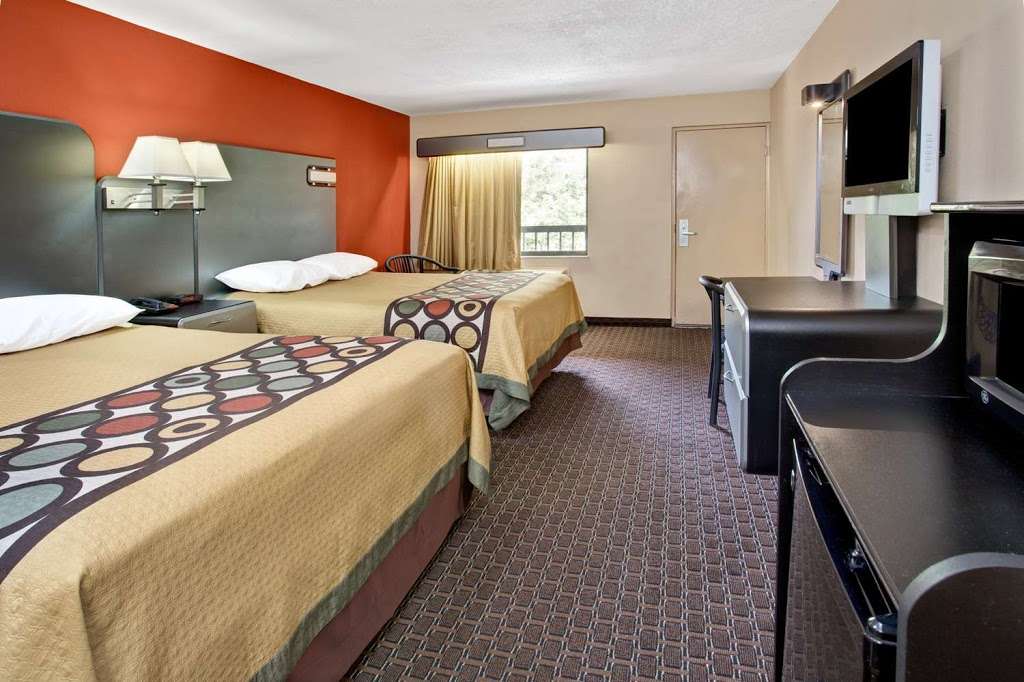 Super 8 by Wyndham Kissimmee/Maingate/Orlando Area | Hwy, 5875 W US-192, Kissimmee, FL 34746, USA | Phone: (407) 396-8883