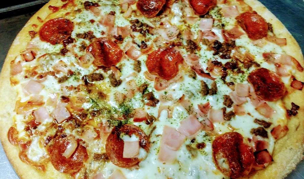 Ugis Pizza | 69 Heath St, Jamaica Plain, MA 02130 | Phone: (617) 606-7160