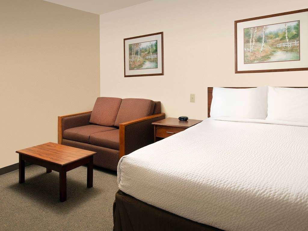 WoodSpring Suites Orlando South | 10401 S John Young Pkwy, Orlando, FL 32837, USA | Phone: (407) 513-9530