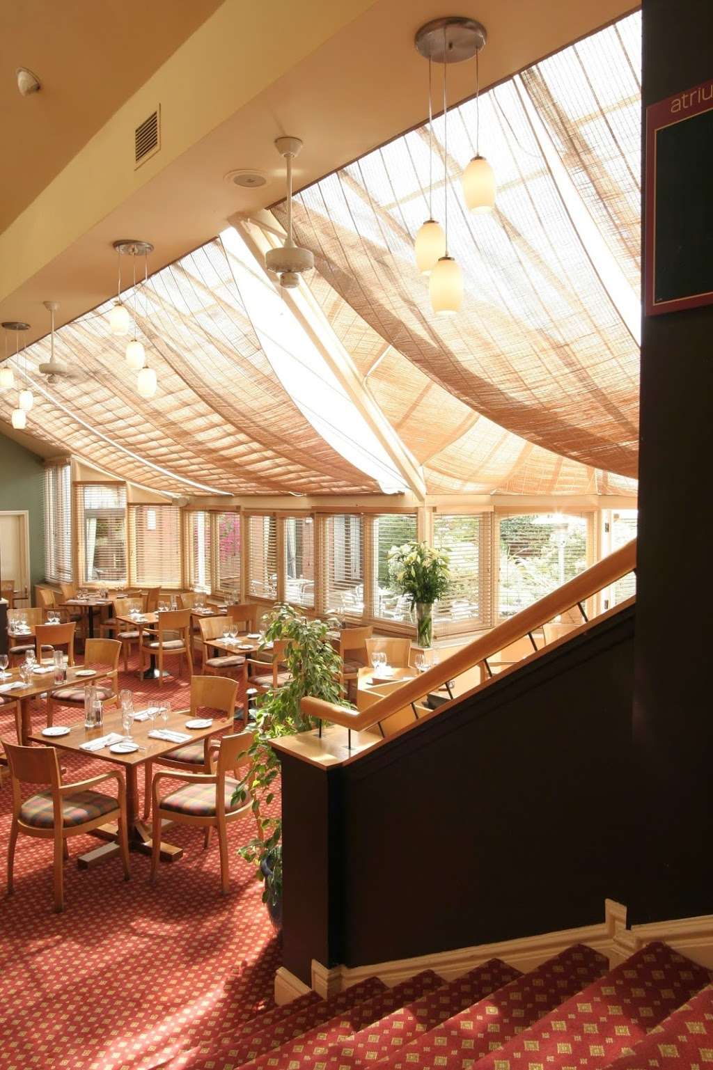 The Atrium Brasserie at Kingston Lodge Hotel | 94 Kingston Hill, Kingston upon Thames KT2 7NP, UK | Phone: 020 8541 4481