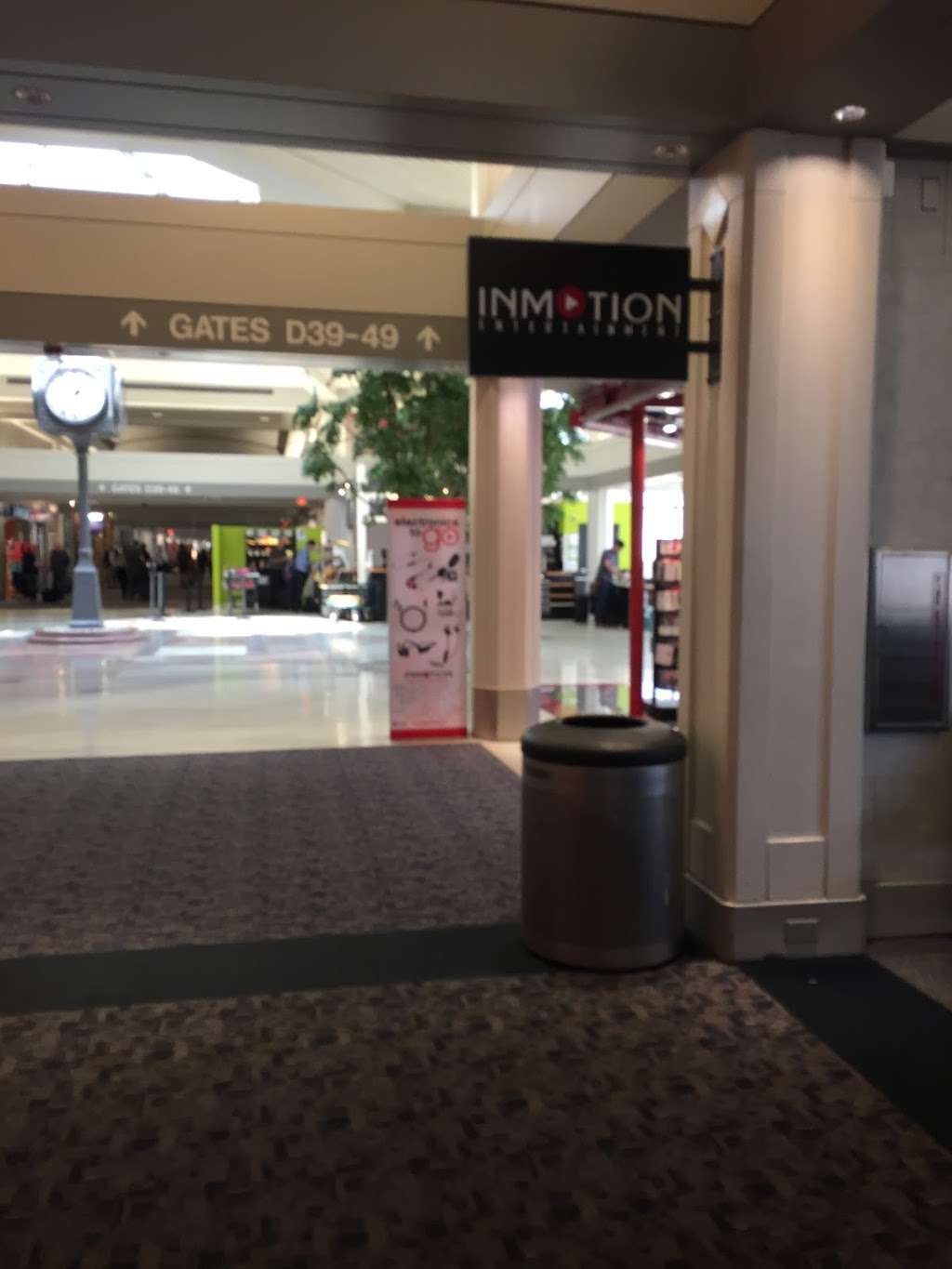 Inmotion Entertainment | Across from Johnny Rockets and next door to Gate D51 in Concourse D of, General Mitchell International Airport, Milwaukee, WI 53207, USA | Phone: (414) 294-9077