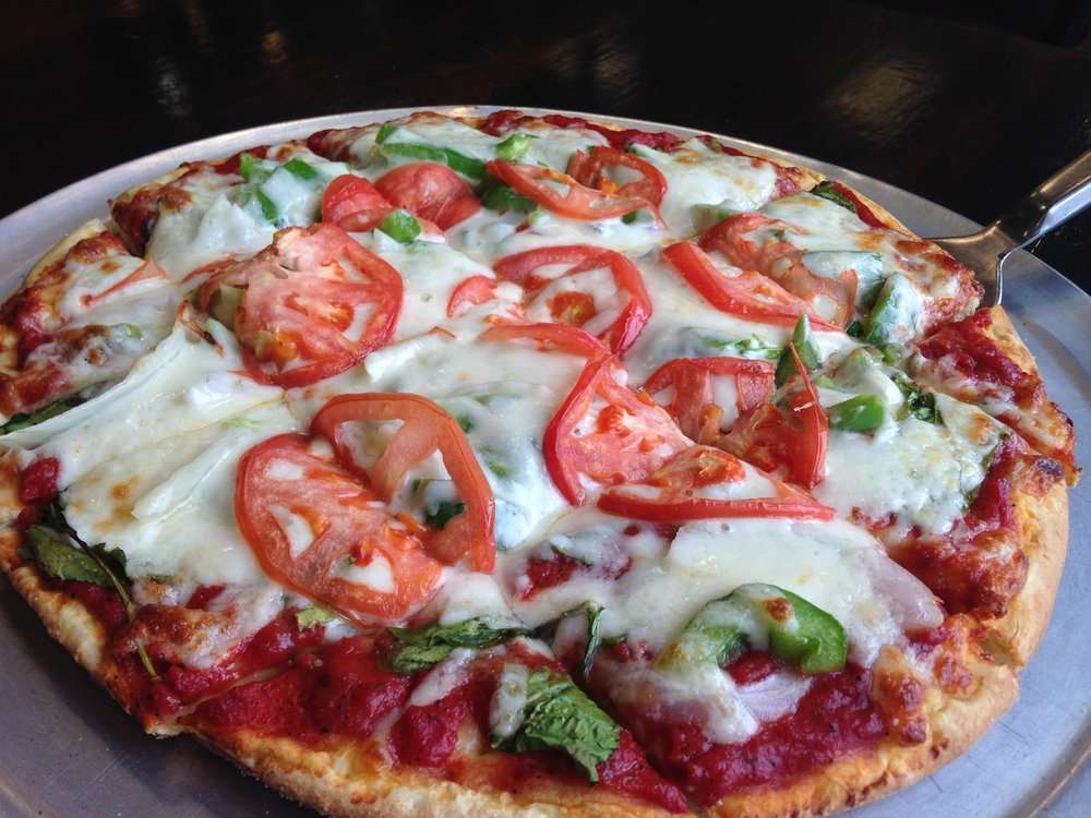 Tapias Pizza on Howard | 2349 Howard St, Chicago, IL 60645 | Phone: (773) 338-6464