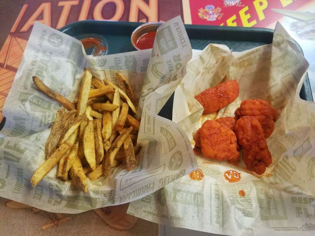 Wingstop | 7035 West Grand Parkway South Suite 40, Richmond, TX 77407, USA | Phone: (832) 595-9464
