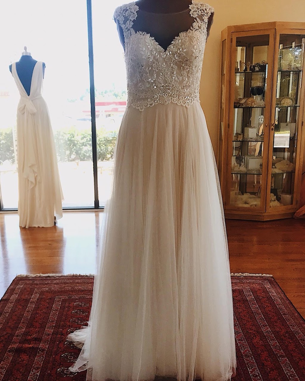 Lauras Couture Collection | 13010 Shawnee Mission Pkwy, Shawnee, KS 66216, USA | Phone: (913) 631-3010