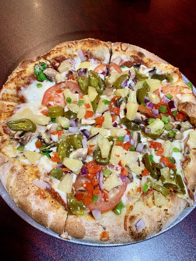 CAP’s Pizza and Tap House | 8760 La Riviera Dr A, Sacramento, CA 95826, USA | Phone: (916) 399-4217