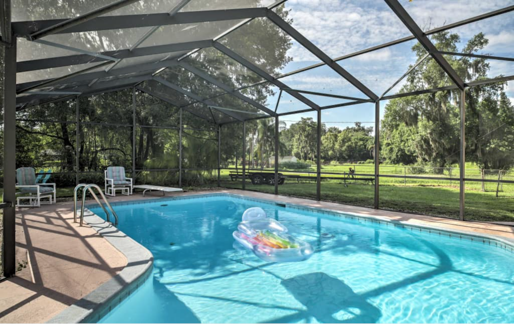 Serene Lakefront Duplex with Pool and Hot Tub | 5399 Jessamine Ln, Orlando, FL 32839, USA | Phone: (803) 984-6733