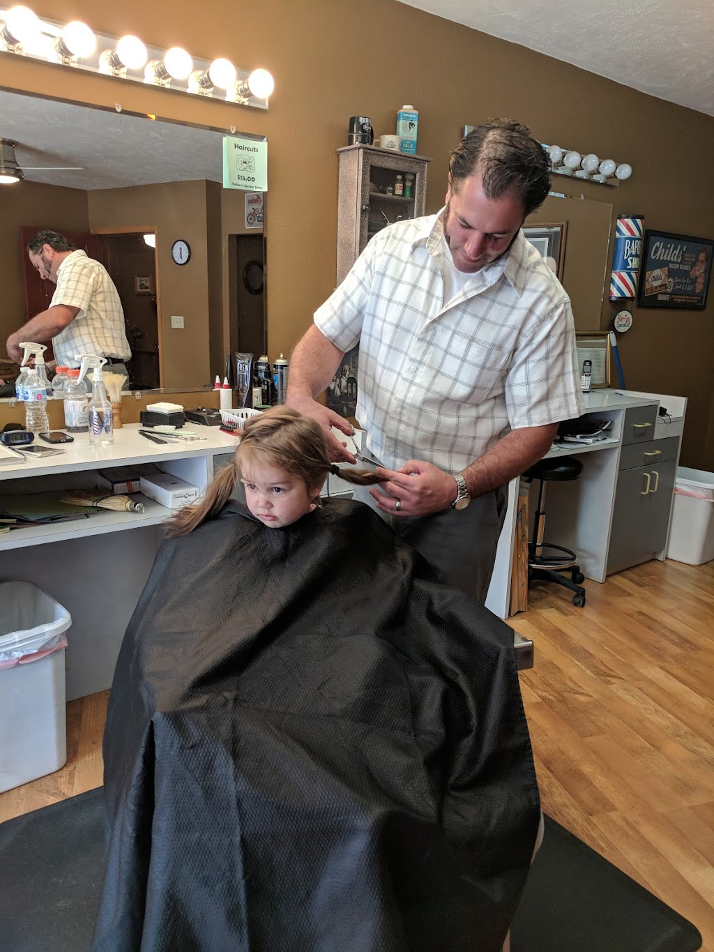 Nathan's Barber Shop in 213 Water St, Jordan, MN 55352, USA