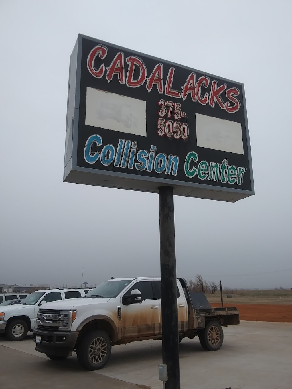 Cadalacks Collision Center | 400 Industrial Park Rd, Kingfisher, OK 73750, USA | Phone: (405) 375-5050