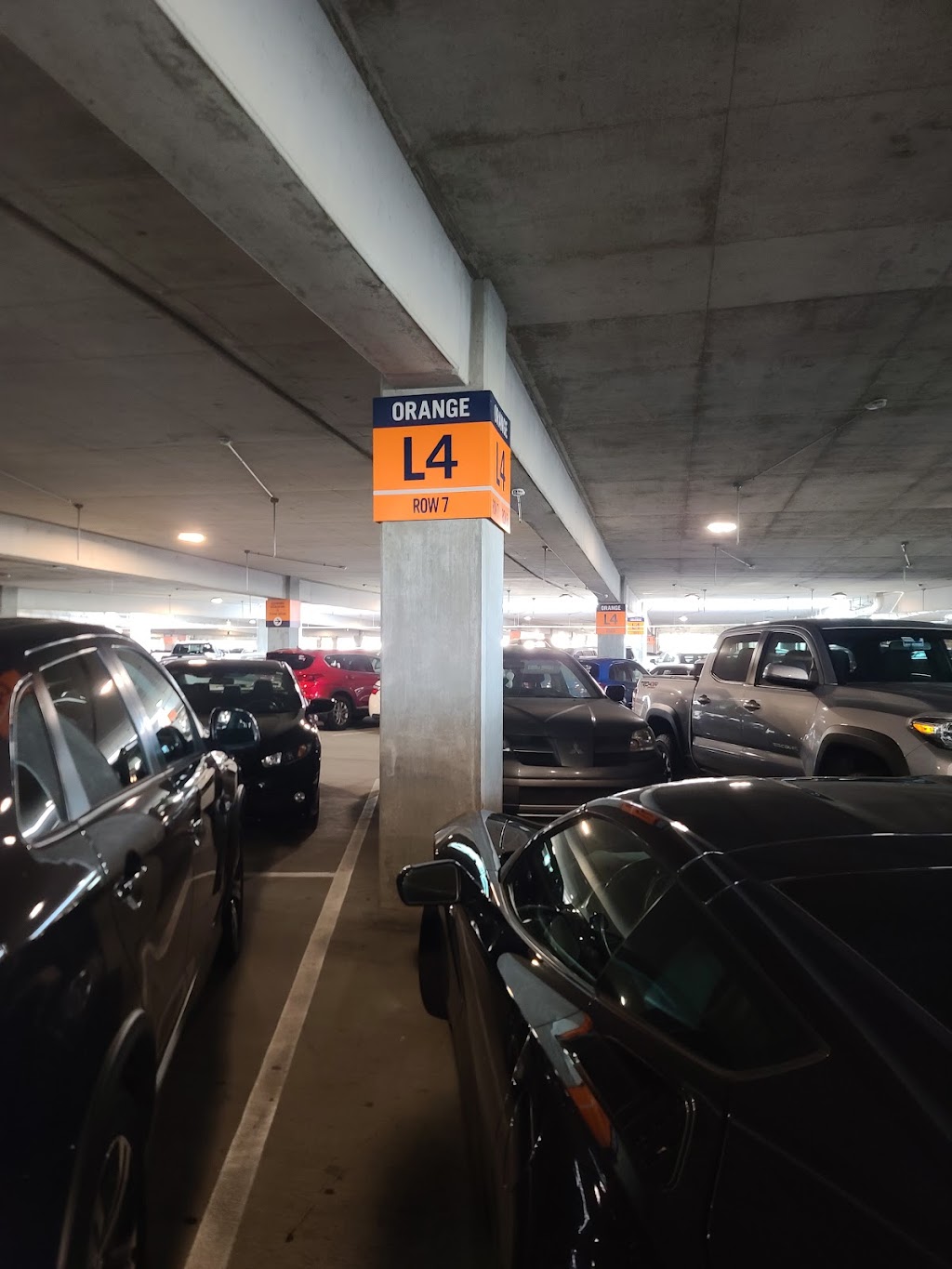 Orange Parking Garage | 1530 E Buena Vista Dr, Lake Buena Vista, FL 32830, USA | Phone: (407) 934-7639