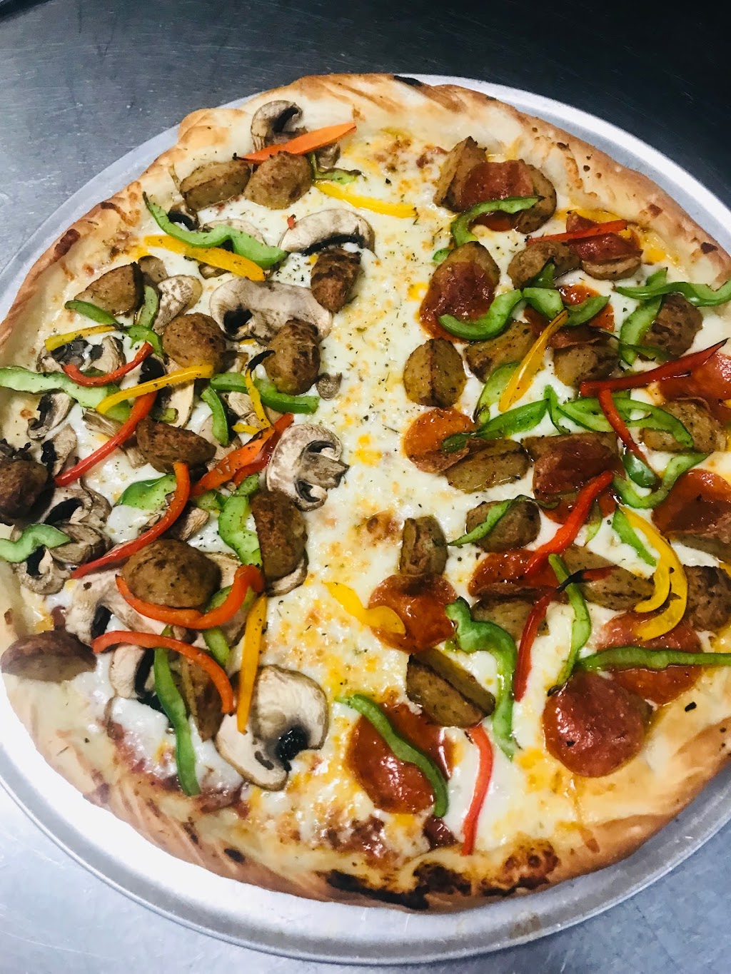 Premo Pizza | 8887 N Chestnut Ave, Fresno, CA 93720, USA | Phone: (559) 298-1122