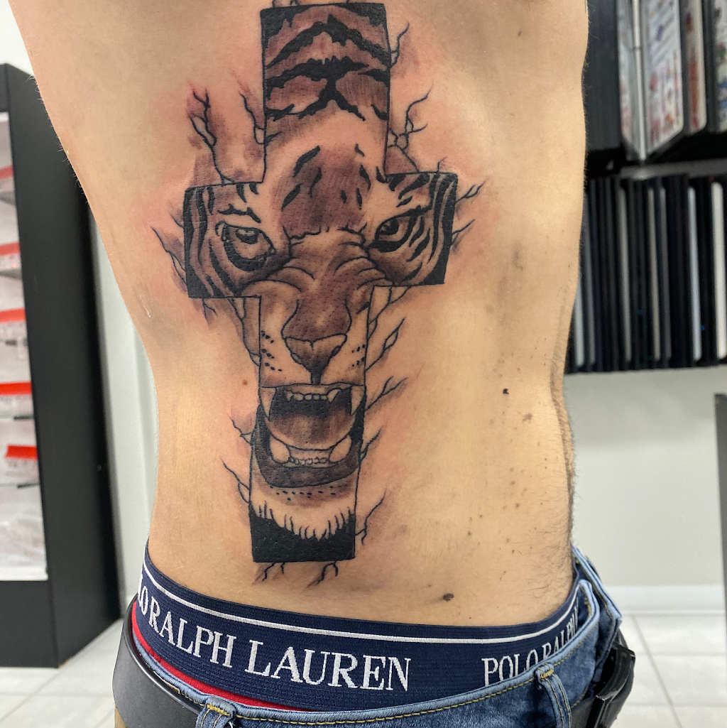 sacred art tattoo | 25100 Telegraph Rd, Flat Rock, MI 48134, USA | Phone: (734) 676-7407