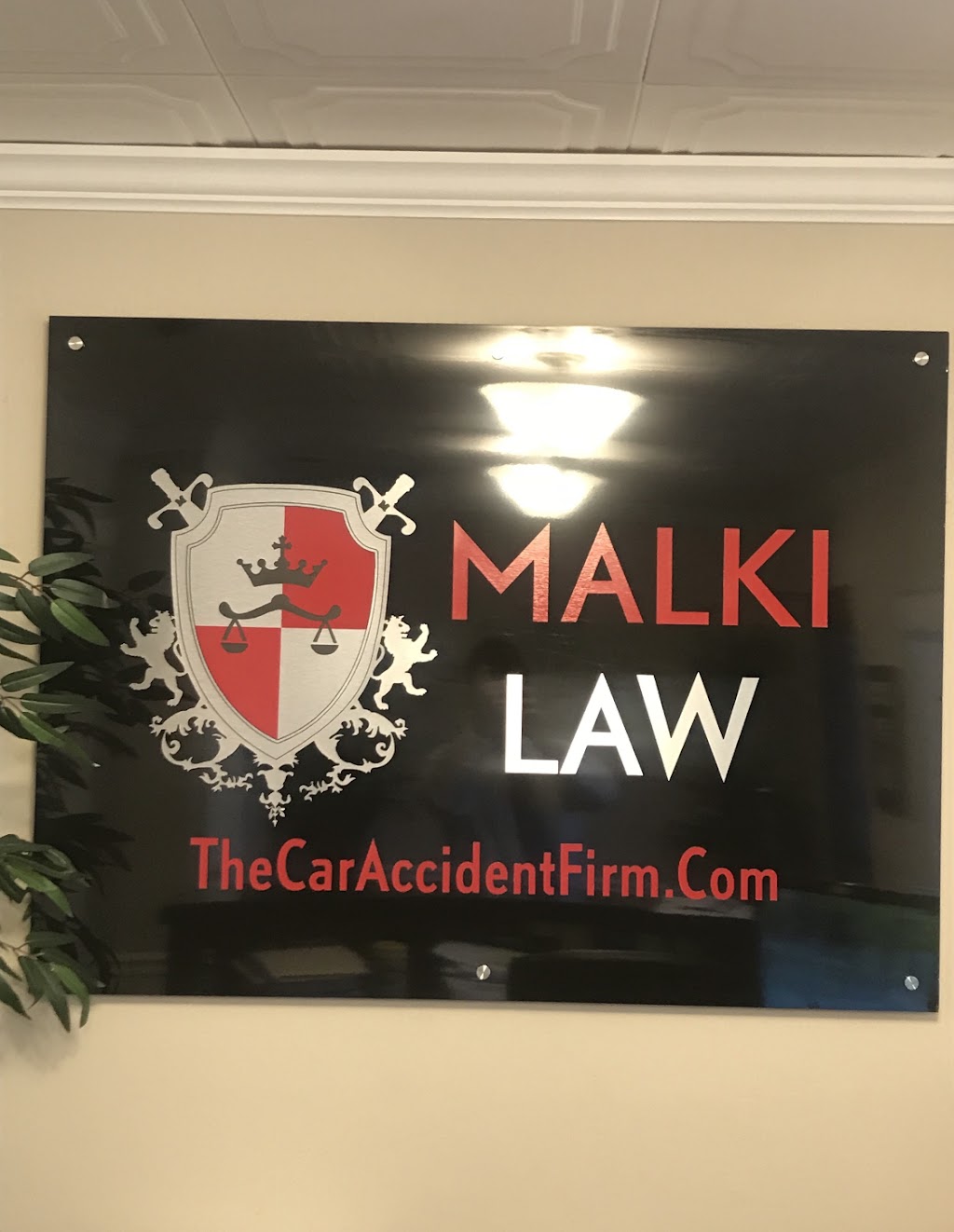 Malki Law Firm | 9701 W Hillsborough Ave, Tampa, FL 33615, USA | Phone: (813) 513-3476