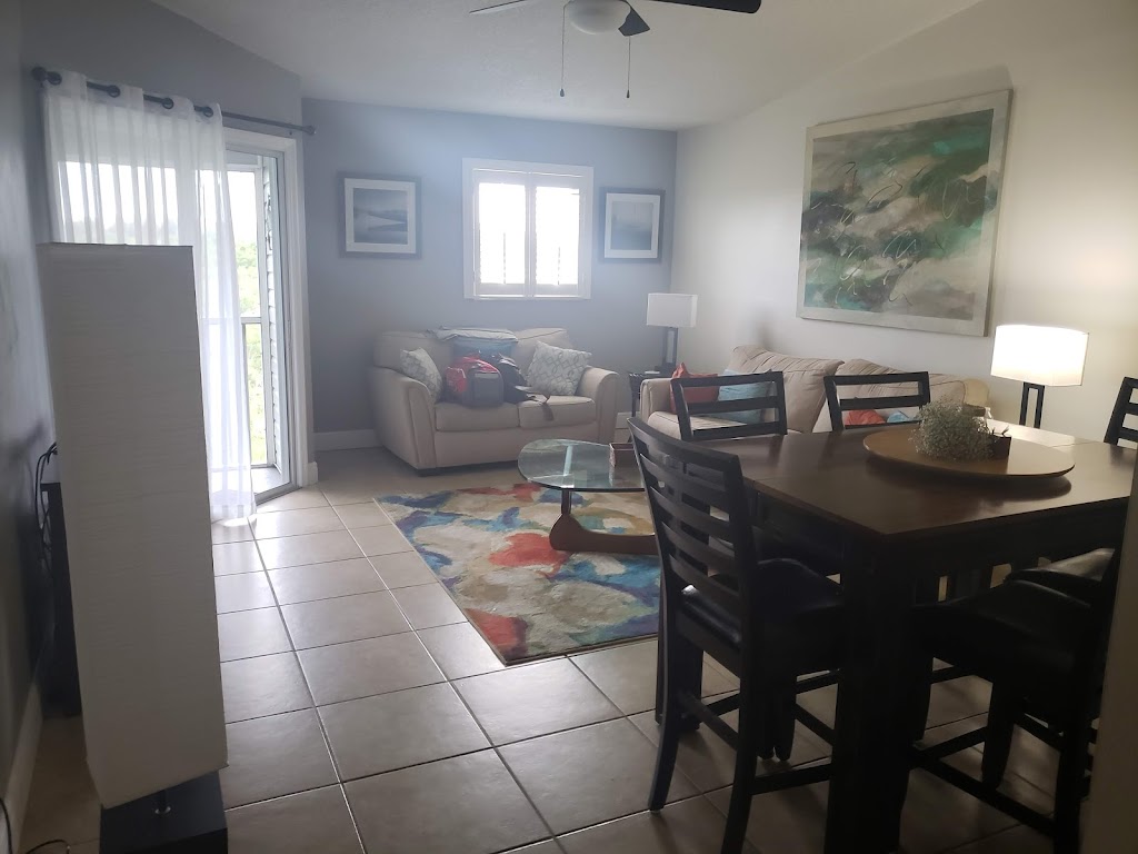 Sandy Point Condominiums by A Paradise Vacation Rentals | 3607 E Bay Dr, Holmes Beach, FL 34217 | Phone: (941) 778-4800