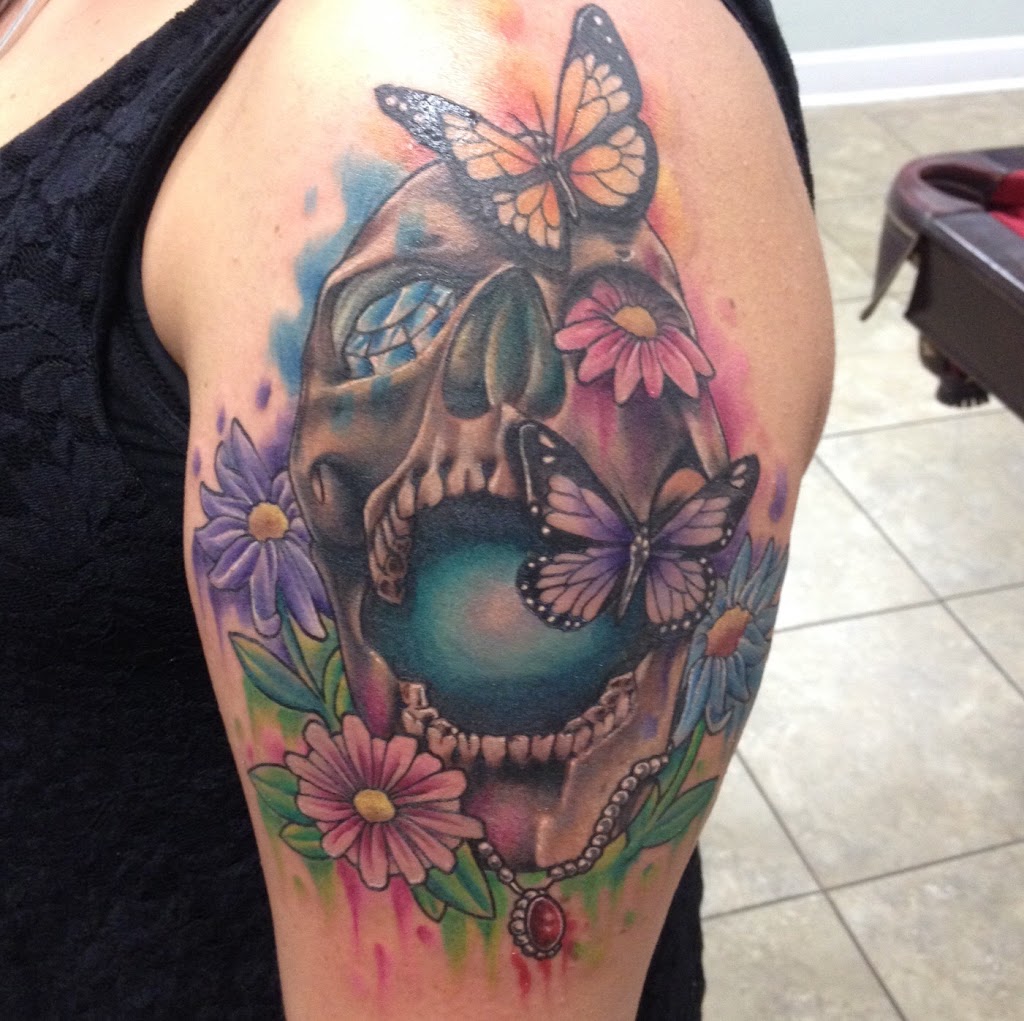 Rock N Roll Tattoo & Piercing | 3629 Capital Blvd #240, Raleigh, NC 27604, USA | Phone: (919) 872-2881