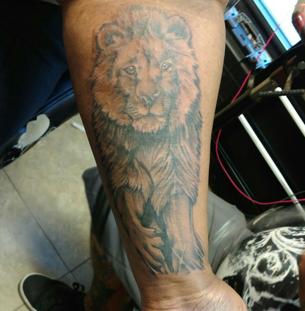 Rock N Roll Tattoo & Piercing | 3629 Capital Blvd #240, Raleigh, NC 27604, USA | Phone: (919) 872-2881