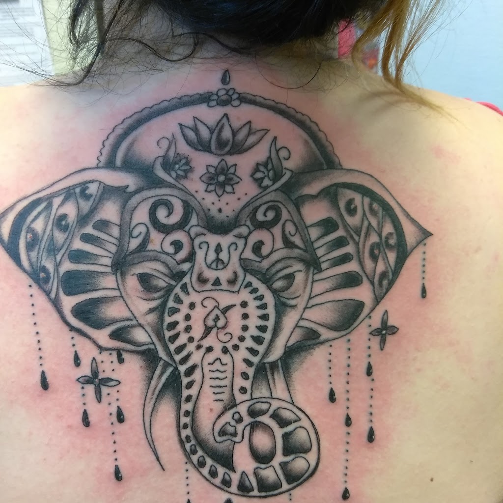 T-Doggs Tattoos & Body Piercing | 12149 Bellefontaine Rd, St. Louis, MO 63138, USA | Phone: (314) 355-0200