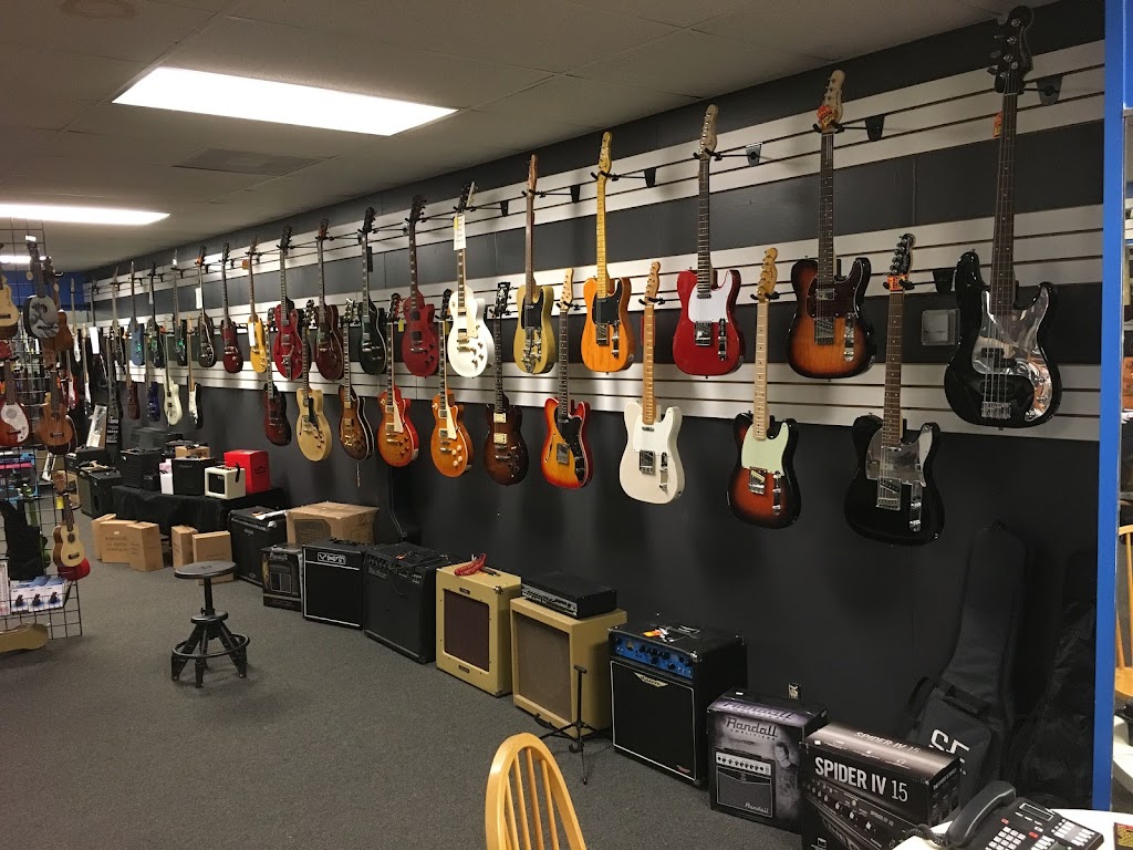 Guitarasaur Guitars & Ukuleles (In Painted Tree) | 2240 Justin Rd, Highland Village, TX 75077, USA | Phone: (817) 456-6864