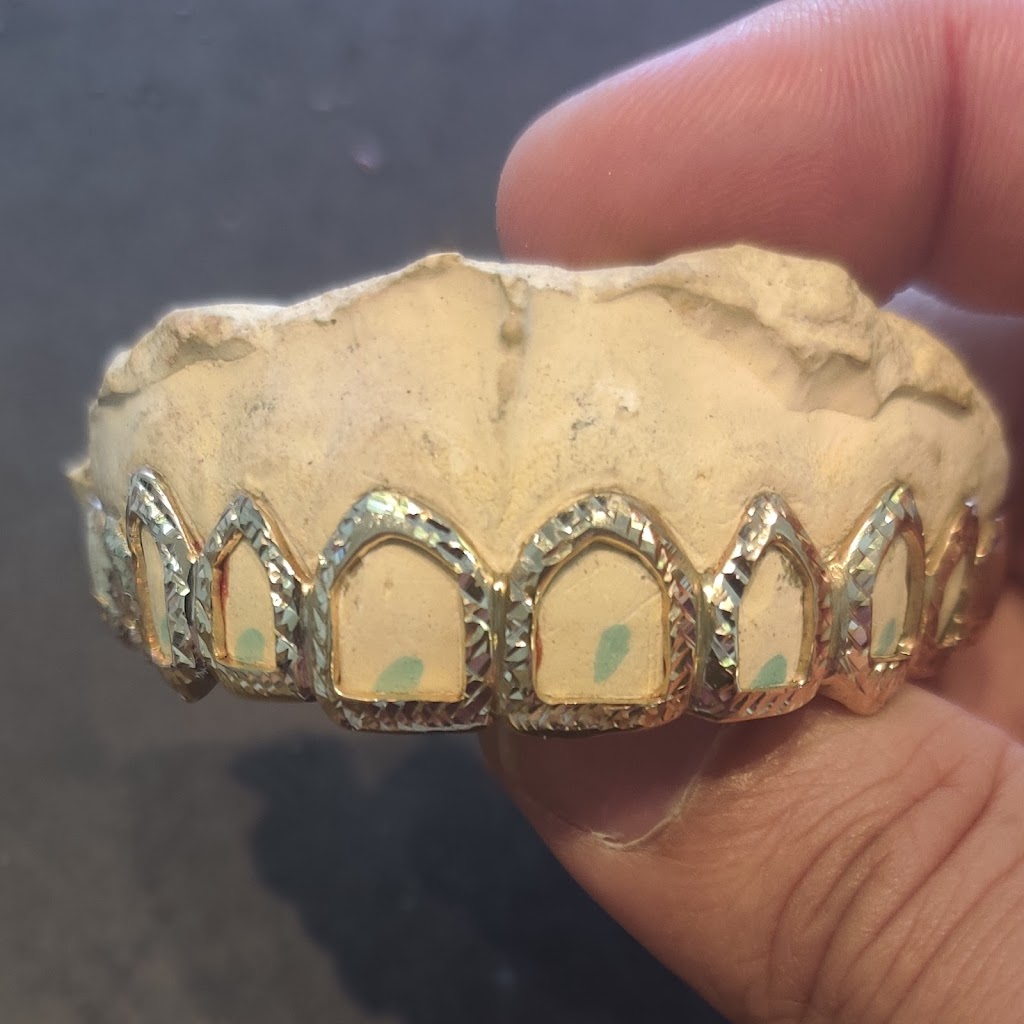 Au Grillz Jeweller | 153 International Blvd, Oakland, CA 94606, USA | Phone: (510) 238-8770