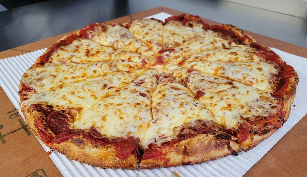 Saucey Slices Pizzeria | 90 Madison St, Port Clinton, OH 43452, USA | Phone: (419) 301-3408