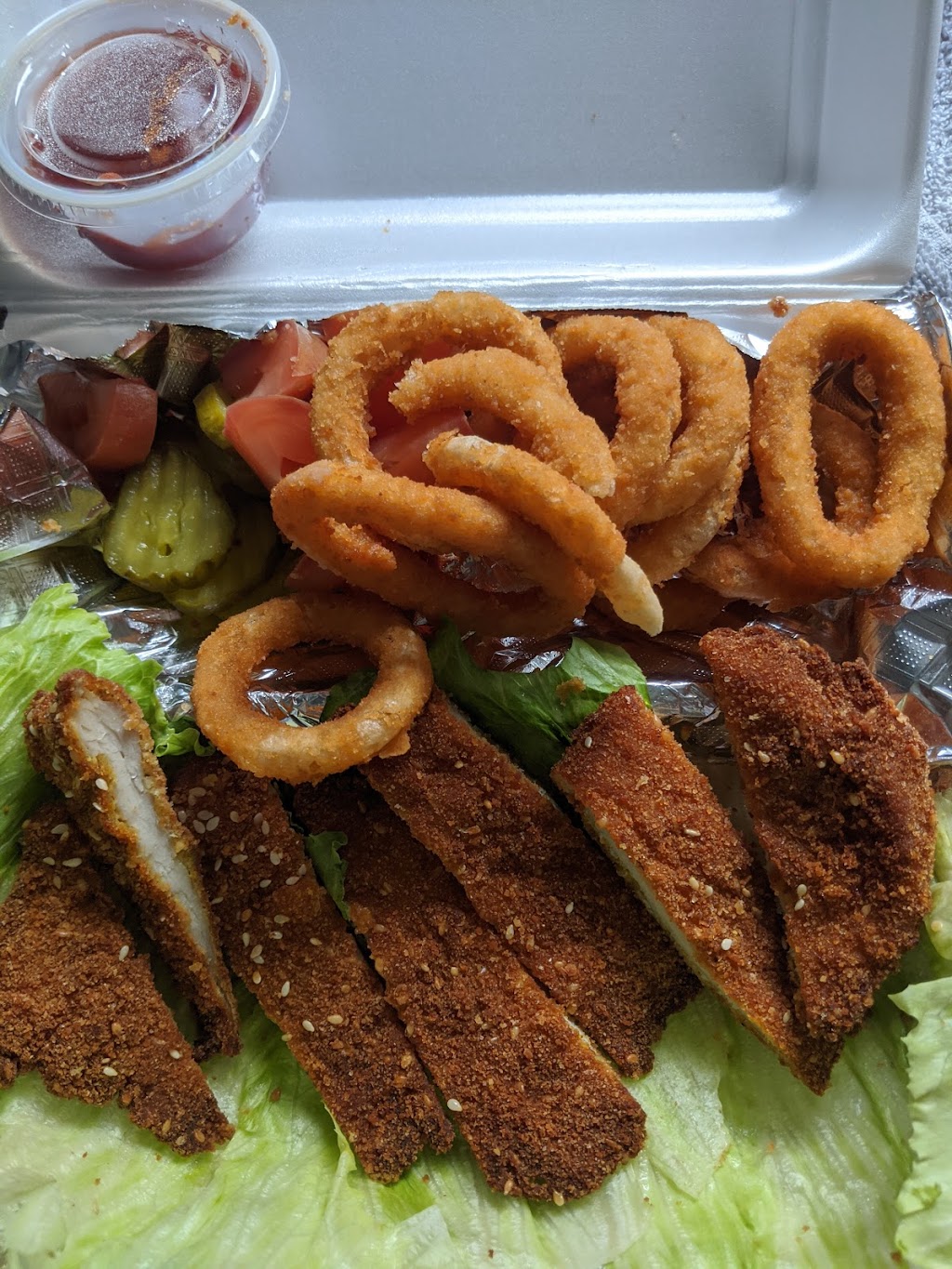 Uptown burgers and chicken schnitzel | 3151 Calhoun St, New Orleans, LA 70125, USA | Phone: (504) 571-5928