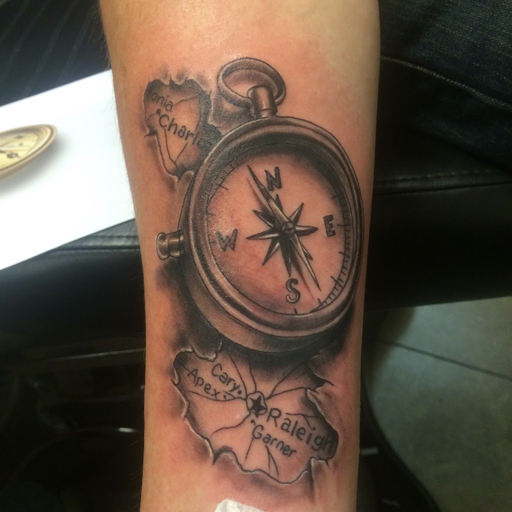 Rock N Roll Tattoo & Piercing | 3629 Capital Blvd #240, Raleigh, NC 27604, USA | Phone: (919) 872-2881