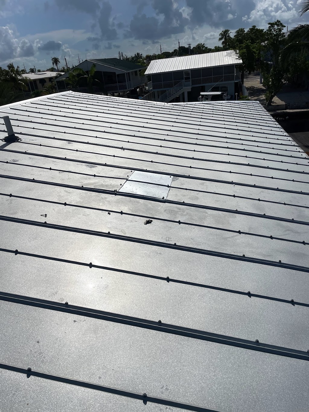 Andy the roofer & co | 210 W 2nd Ct, Key Largo, FL 33037, USA | Phone: (305) 451-1552