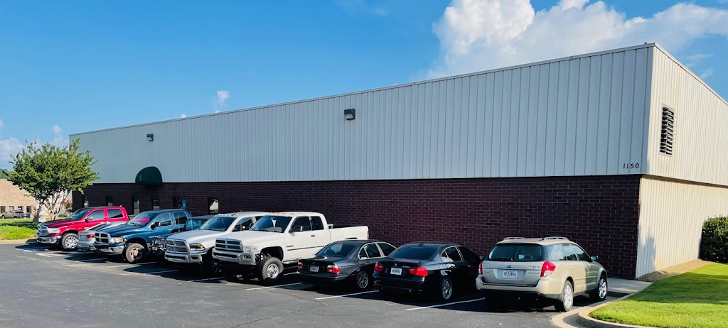 Genos Garage | 1150 Samples Industrial Dr, Cumming, GA 30041, USA | Phone: (770) 886-2500