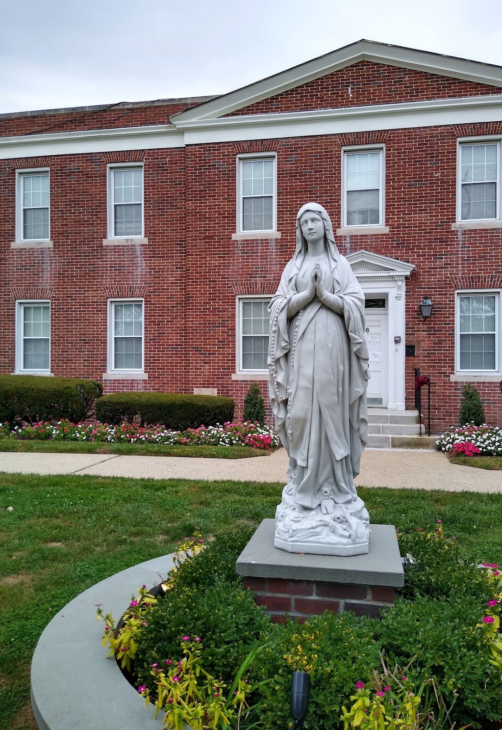 Queen of the Most Holy Rosary | 196 W Centennial Ave, Roosevelt, NY 11575, USA | Phone: (516) 378-1315