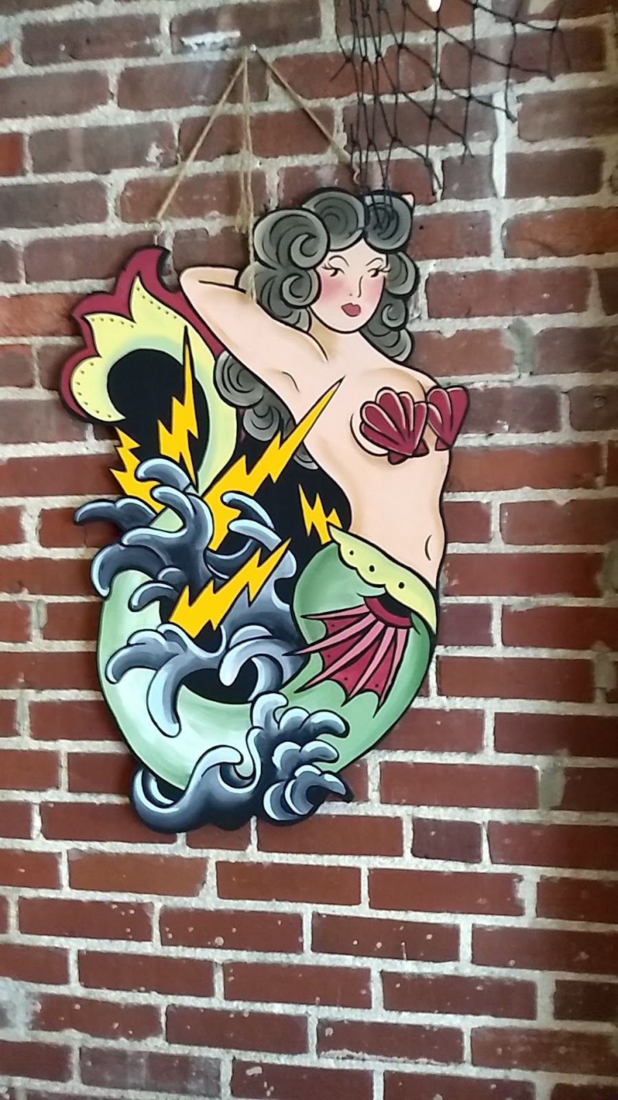 Electric Mermaid Tattoo | 8 N 2nd St, Fernandina Beach, FL 32034, USA | Phone: (904) 432-8306