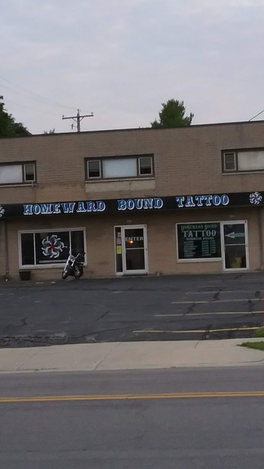 Homeward Bound Tattoo | 1718 N Main St, West Bend, WI 53090, USA | Phone: (262) 334-4297