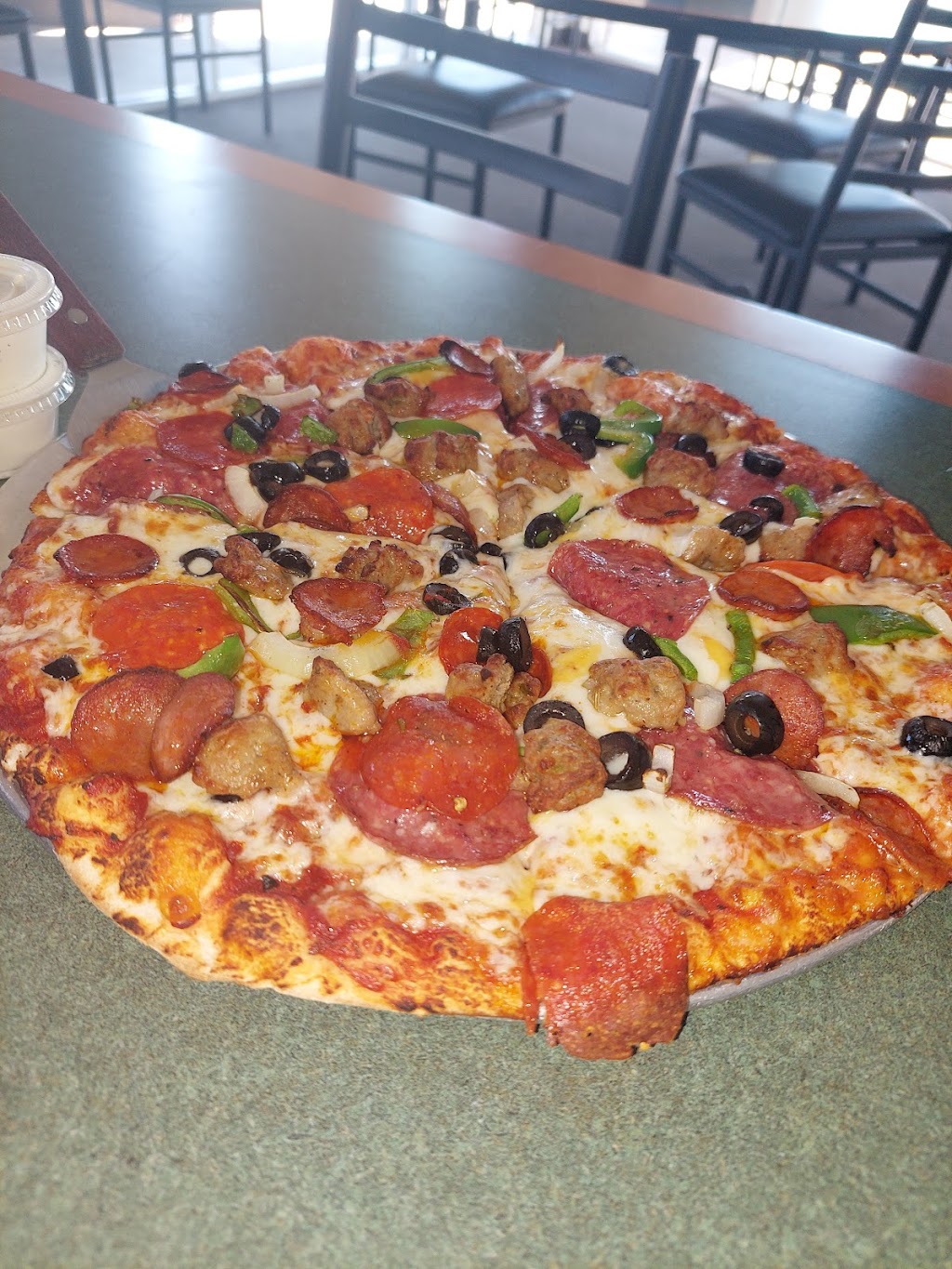 Round Table Pizza | 7141 S Eastern Ave #4A-C, Las Vegas, NV 89119, USA | Phone: (702) 483-6700